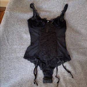 Victoria’s Secret black lace body suit. Peekaboo